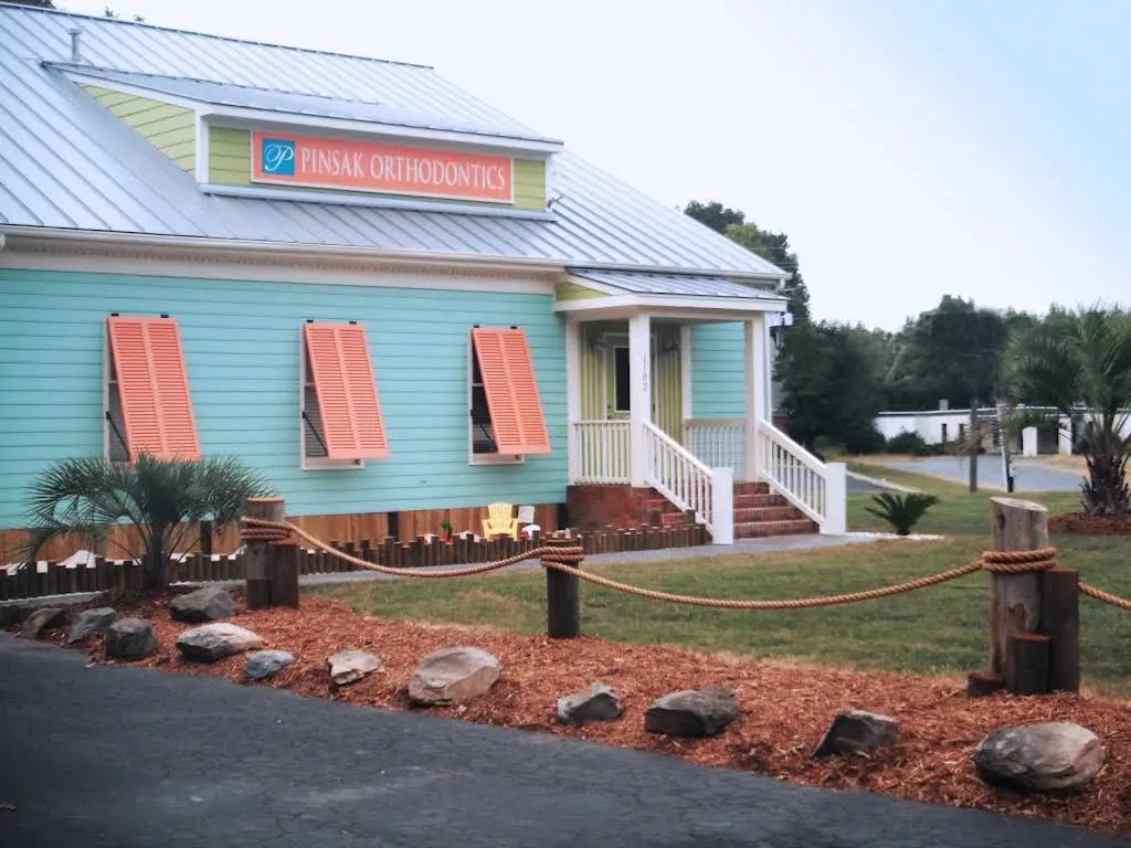 Pinsak & Sayania Orthodontics - Professional dental clinic exterior with modern facilities