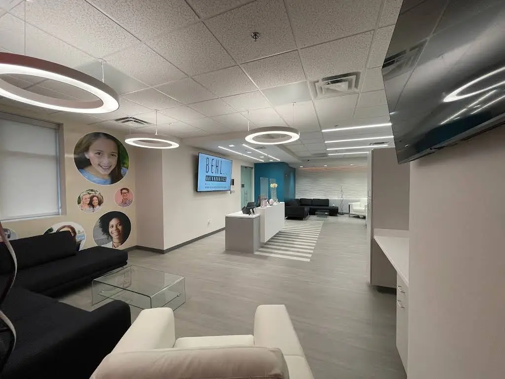 Madan Periodontics & Implant Dentistry of Suffolk | ICON Smile Studios - Professional dental clinic exterior with modern facilities