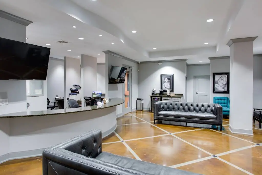 North Carolina Oral Surgery + Orthodontics - Professional dental clinic exterior with modern facilities