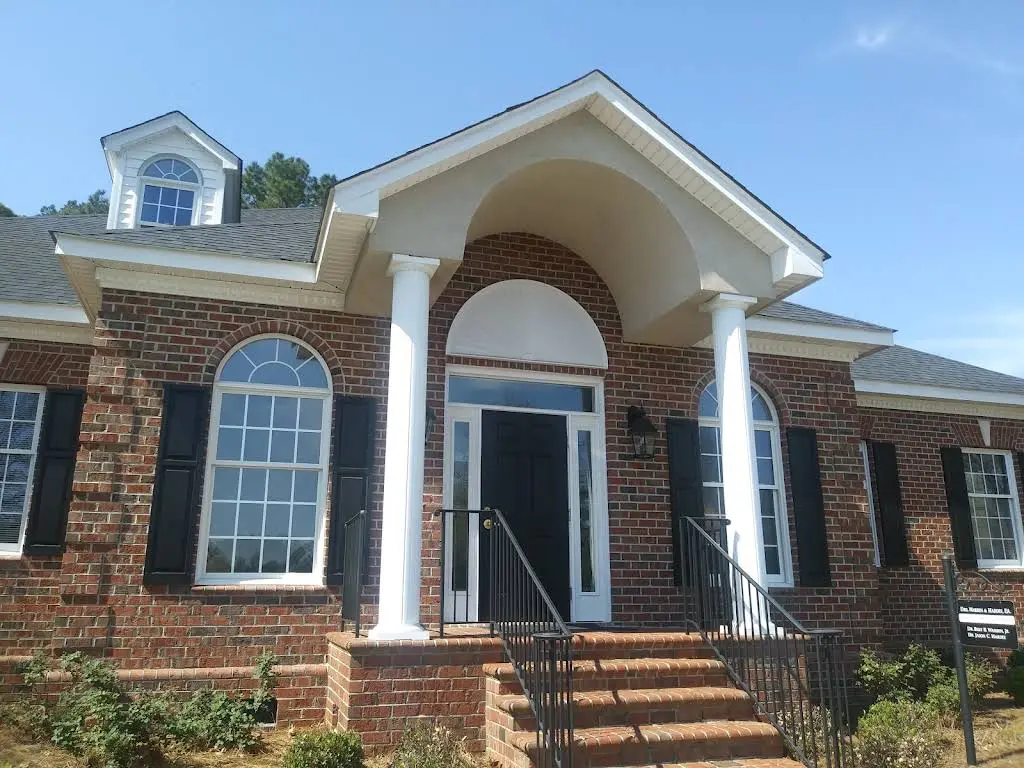 Drs. Warren & Hardee, P.A. - Professional dental clinic exterior with modern facilities