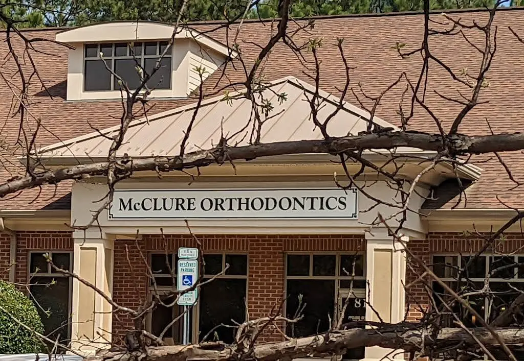 McClure Orthodontics - Professional dental clinic exterior with modern facilities