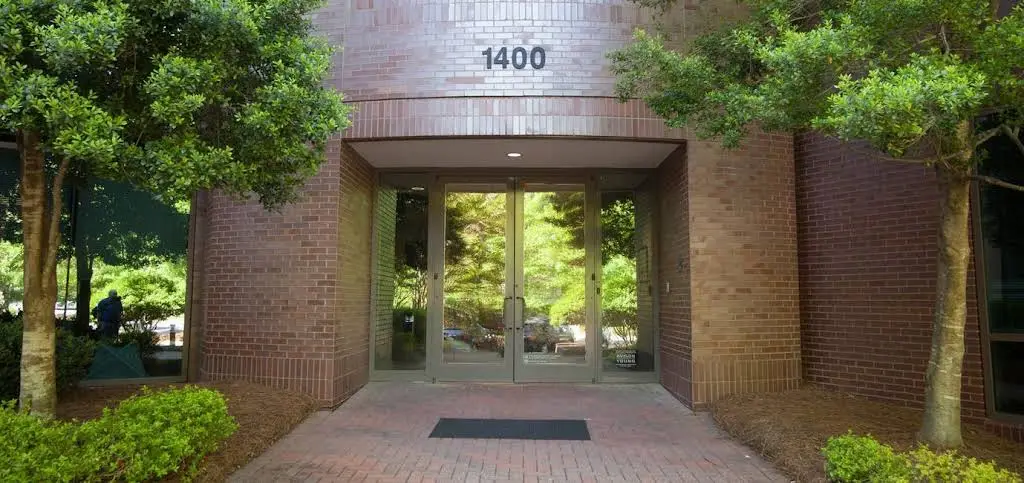 Cary Prosthodontics Implant & Cosmetic Dentistry - Professional dental clinic exterior with modern facilities