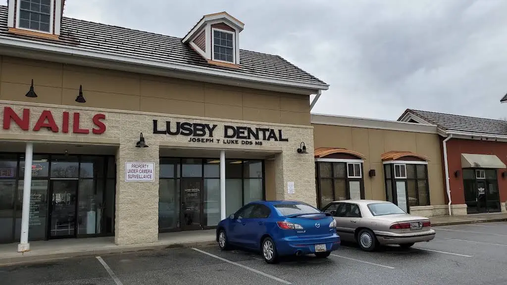 Dr. Joseph Luke | Lusby Dental - Professional dental clinic exterior with modern facilities