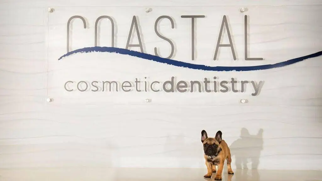 Coastal Cosmetic & Implant Dentistry - Professional dental clinic exterior with modern facilities