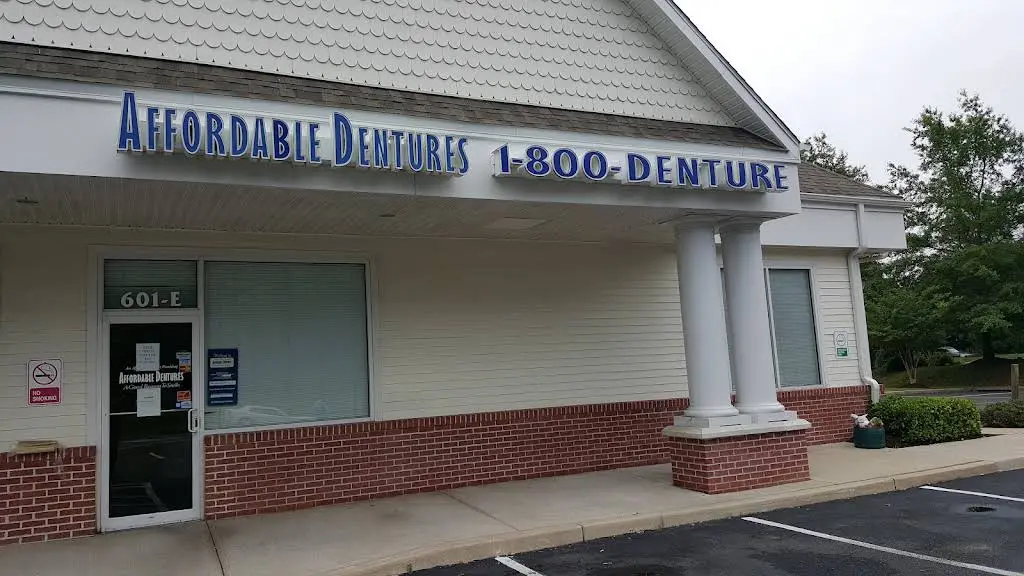 Affordable Dentures & Implants - Professional dental clinic exterior with modern facilities