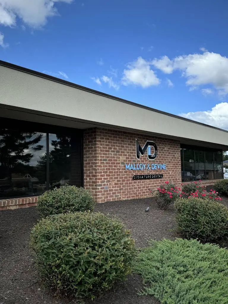 Malloy & Devine Signature Dental - Professional dental clinic exterior with modern facilities