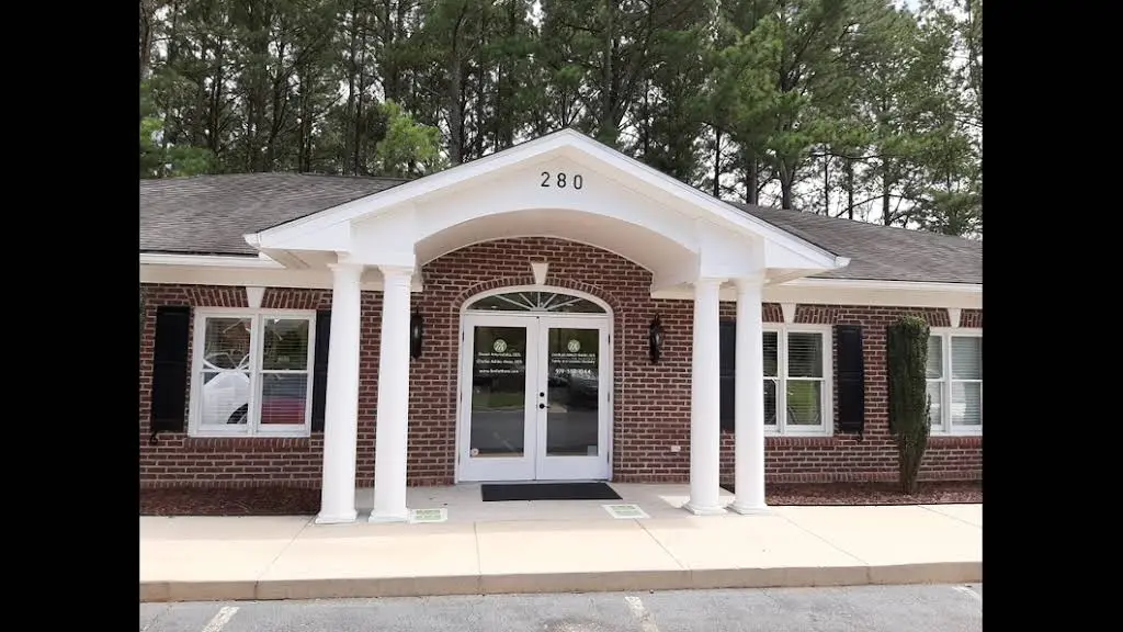 Charles Ashley Mann, DDS & Associates - Professional dental clinic exterior with modern facilities