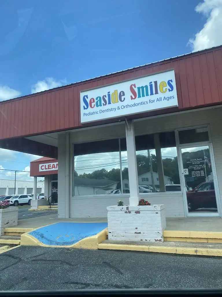 Seaside Smiles - Professional dental clinic exterior with modern facilities