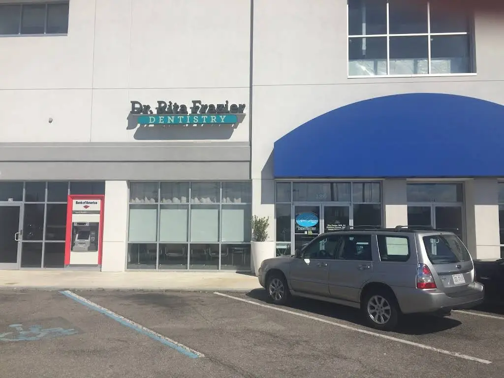 Amen Dental Care Center & Dr. Rita Frazier - Professional dental clinic exterior with modern facilities