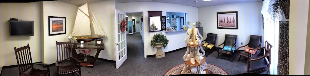 Dolenuck Dentistry - Professional dental clinic exterior with modern facilities
