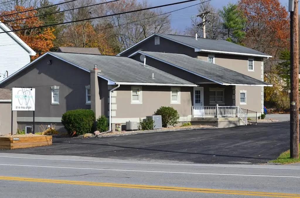 K&C Denture Centers, Inc. - Professional dental clinic exterior with modern facilities