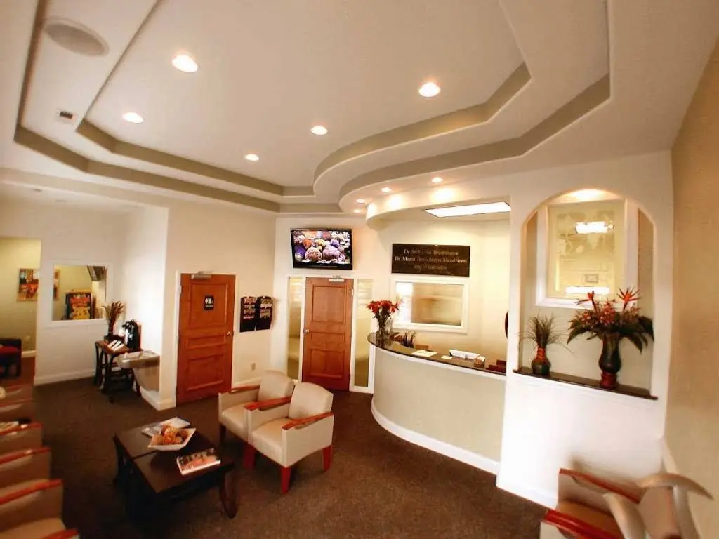 Dr. Stelianos A. Bredologos & Dr. Maria Mendrinos, Family and Cosmetic Dentistry - Professional dental clinic exterior with modern facilities