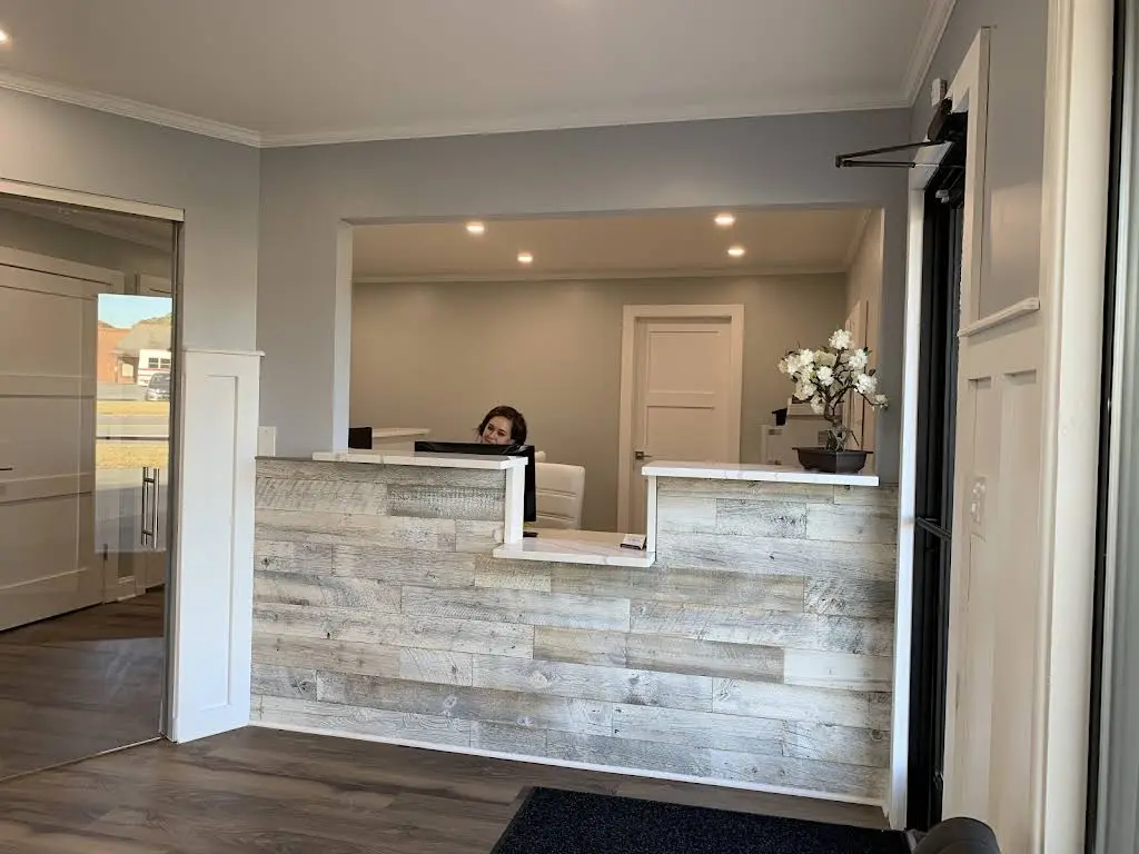 Carolina Dentistry & Dentures - Professional dental clinic exterior with modern facilities