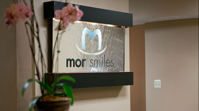 Mor Smiles - Professional dental clinic exterior with modern facilities