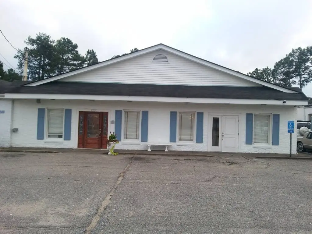 Dr. Tuggle Family Dentist Group - Professional dental clinic exterior with modern facilities