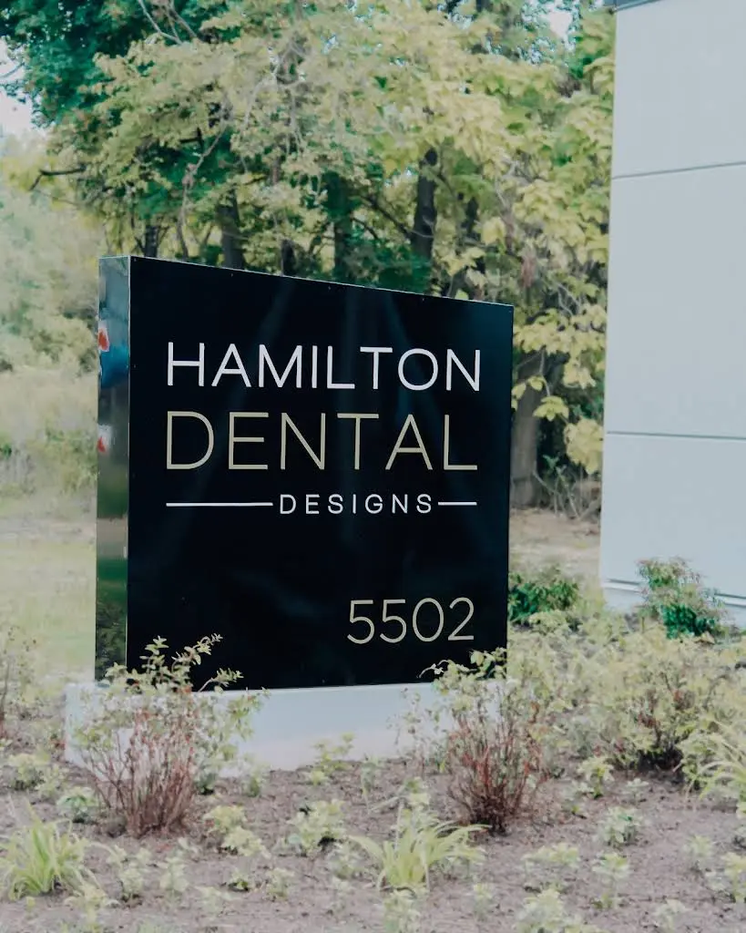 Hamilton Dental Designs: Jose A. Gil, DMD - Professional dental clinic exterior with modern facilities