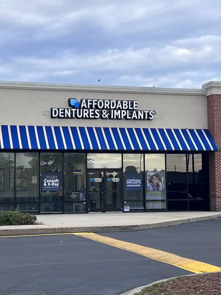 Affordable Dentures & Implants - Professional dental clinic exterior with modern facilities