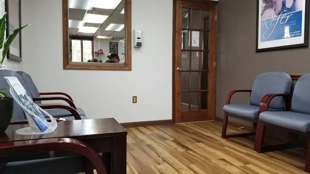 Advanced & Comfort Dentistry - Professional dental clinic exterior with modern facilities