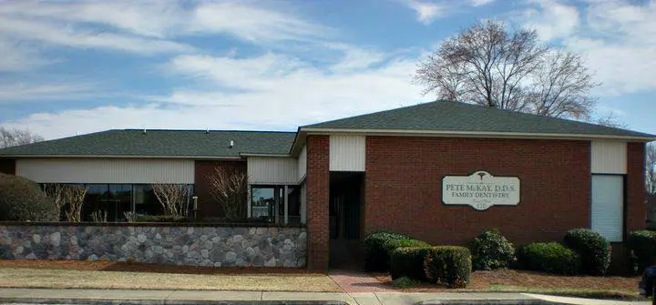 Dr. Pete McKay - Professional dental clinic exterior with modern facilities