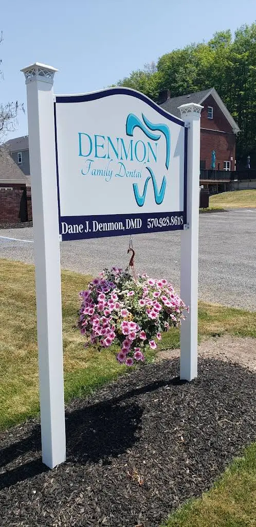 Denmon Family Dental - Professional dental clinic exterior with modern facilities