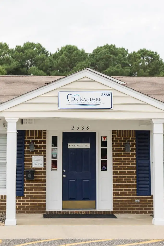 The Comfort Dentist - Wesley P. Kandare, DDS - Professional dental clinic exterior with modern facilities