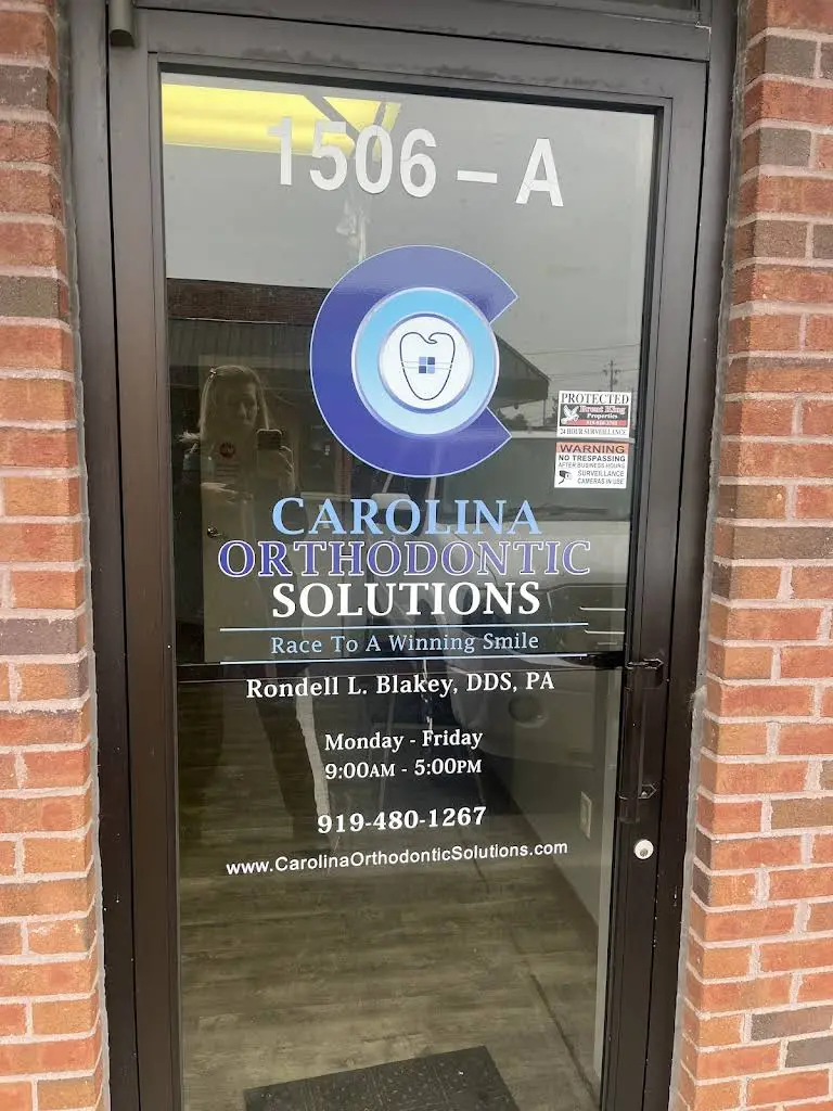 Carolina Orthodontic Solutions - Professional dental clinic exterior with modern facilities