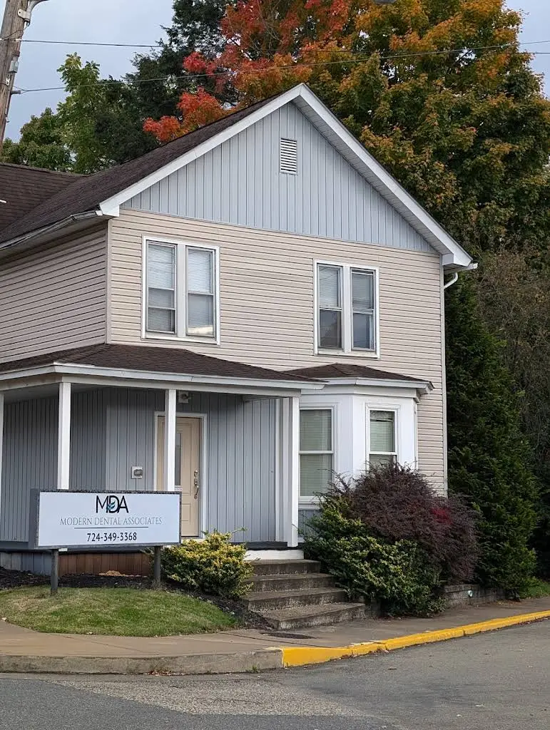 Modern Dental Associates - Professional dental clinic exterior with modern facilities