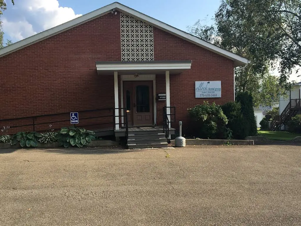 Ollock Dental Group - Professional dental clinic exterior with modern facilities
