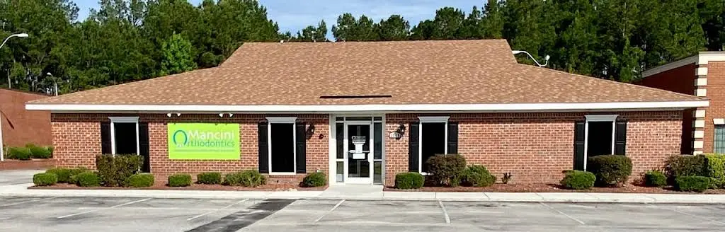 Mancini Orthodontics - Professional dental clinic exterior with modern facilities