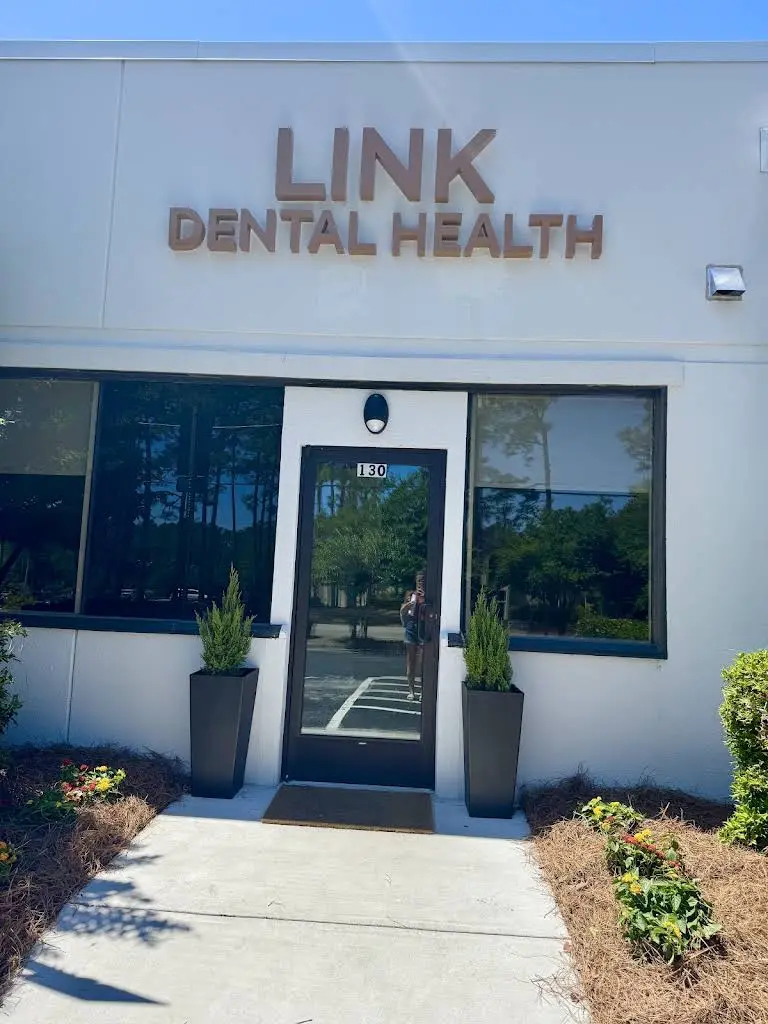 Link Dental Health - Professional dental clinic exterior with modern facilities