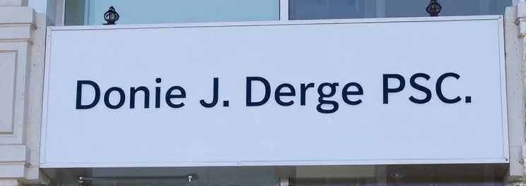 Nonie J George PSC - Professional dental clinic exterior with modern facilities