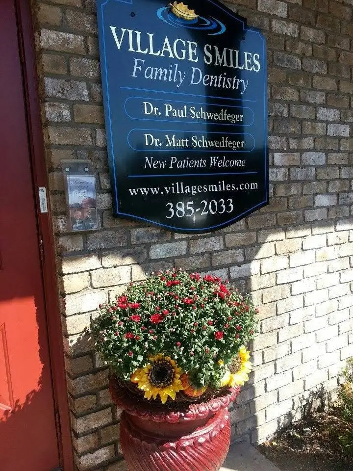 Village Smiles Family Dentistry - Professional dental clinic exterior with modern facilities