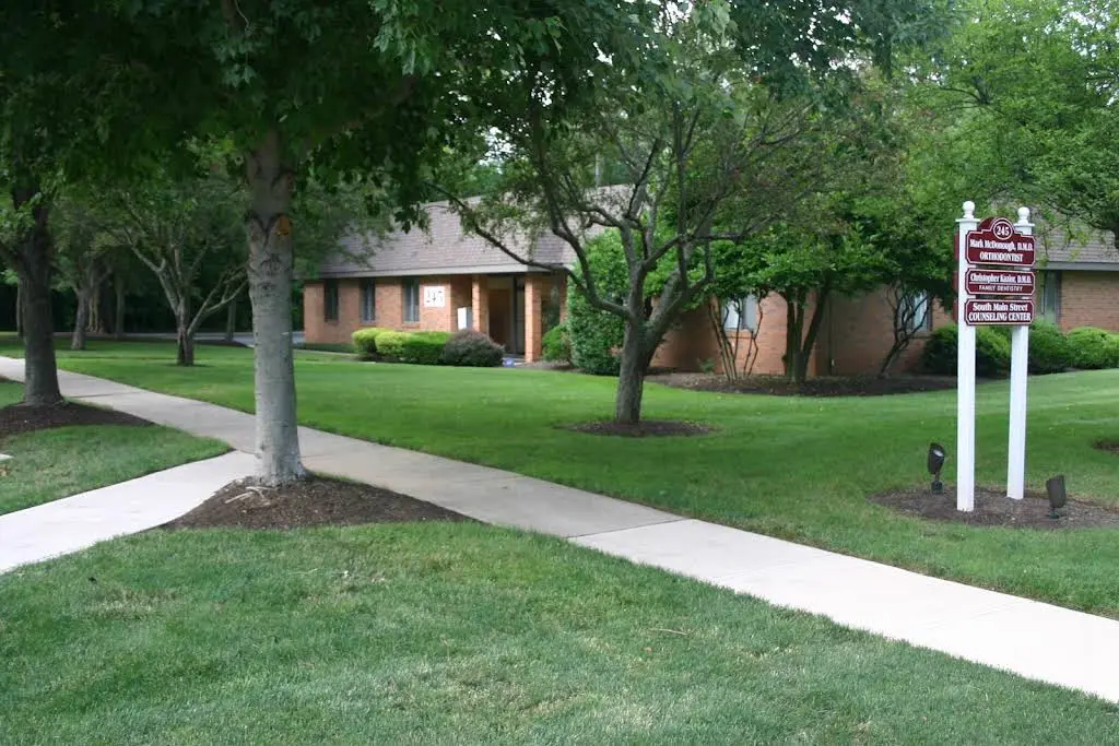Mark McDonough DMD Orthodontist - Professional dental clinic exterior with modern facilities