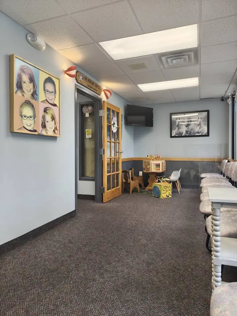 Myriam Cerezo, DMD, Pediatric Dentist / Smiling Kids - Professional dental clinic exterior with modern facilities
