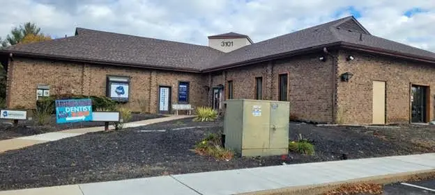 Amazing Smiles By Design - Professional dental clinic exterior with modern facilities