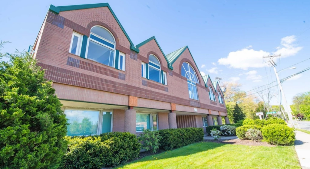 Comprehensive Dental & Implant Center / The Implant Center at Comprehensive Dental - Professional dental clinic exterior with modern facilities