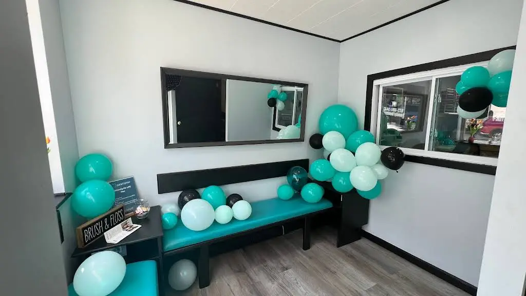 Harrison Implant and Family Dentistry - Professional dental clinic exterior with modern facilities