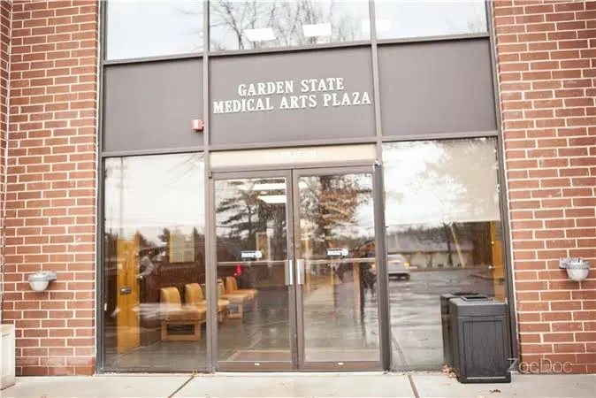 Holmdel Center for Esthetic Periodontics and Implantology - Professional dental clinic exterior with modern facilities