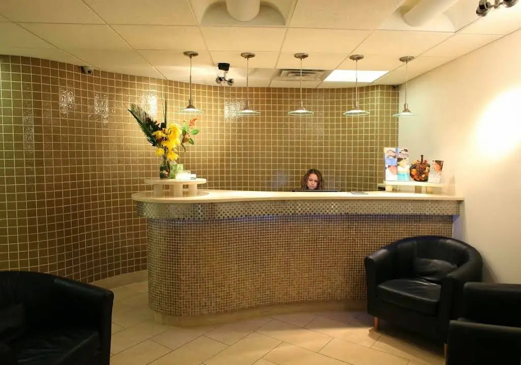 Cosmopolitan Dental - Professional dental clinic exterior with modern facilities