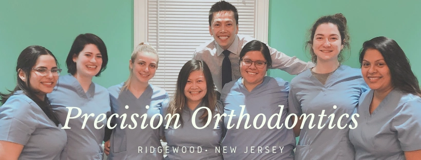 Precision Orthodontics - Professional dental clinic exterior with modern facilities