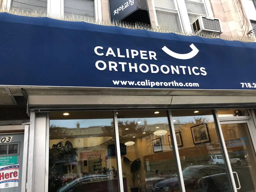 Caliper Orthodontics - Professional dental clinic exterior with modern facilities