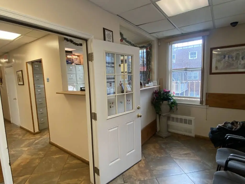 Painless Dental Care PC - Professional dental clinic exterior with modern facilities