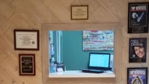 The Offices of Michael G. Molnar - Professional dental clinic exterior with modern facilities