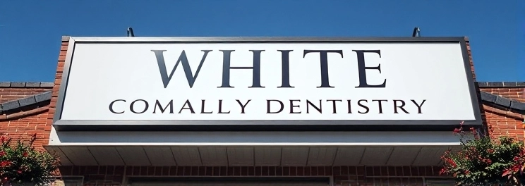 White Cosmetic & Family Dentistry - Professional dental clinic exterior with modern facilities
