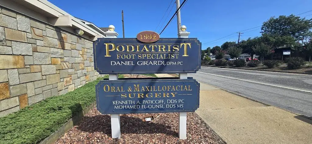 Precision Oral and Maxillofacial Surgery - Professional dental clinic exterior with modern facilities
