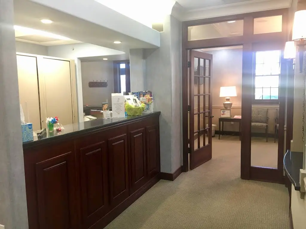 Manisha Bhalla, DMD - Professional dental clinic exterior with modern facilities