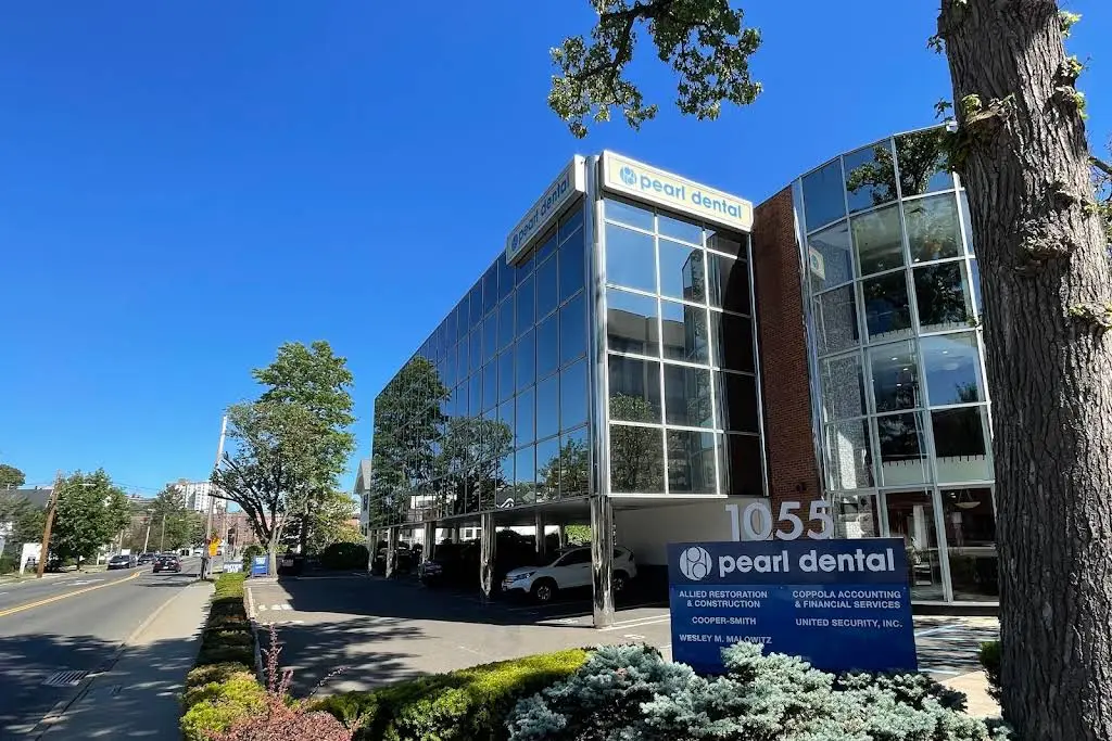 Pearl Dental - Professional dental clinic exterior with modern facilities