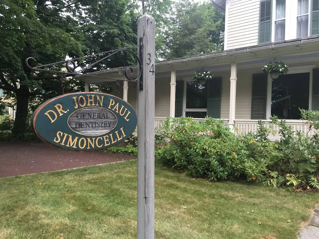 John Paul Simoncelli DDS - Professional dental clinic exterior with modern facilities