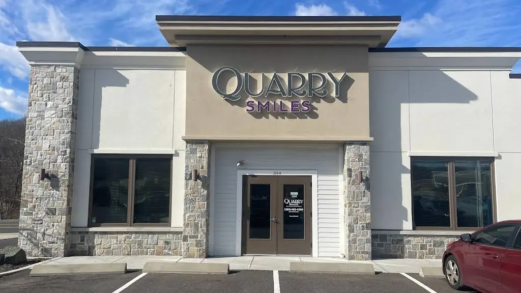 Quarry Smiles - Professional dental clinic exterior with modern facilities