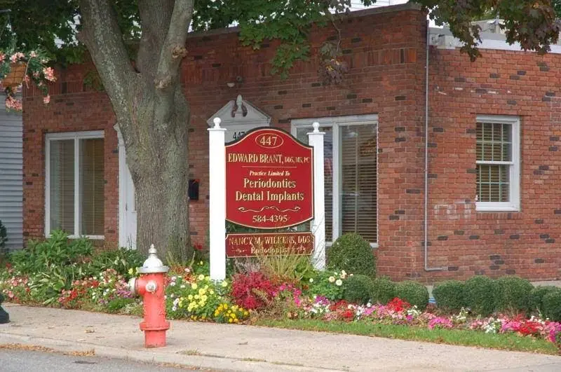 Edward Brant DDS PC Periodontist - Professional dental clinic exterior with modern facilities